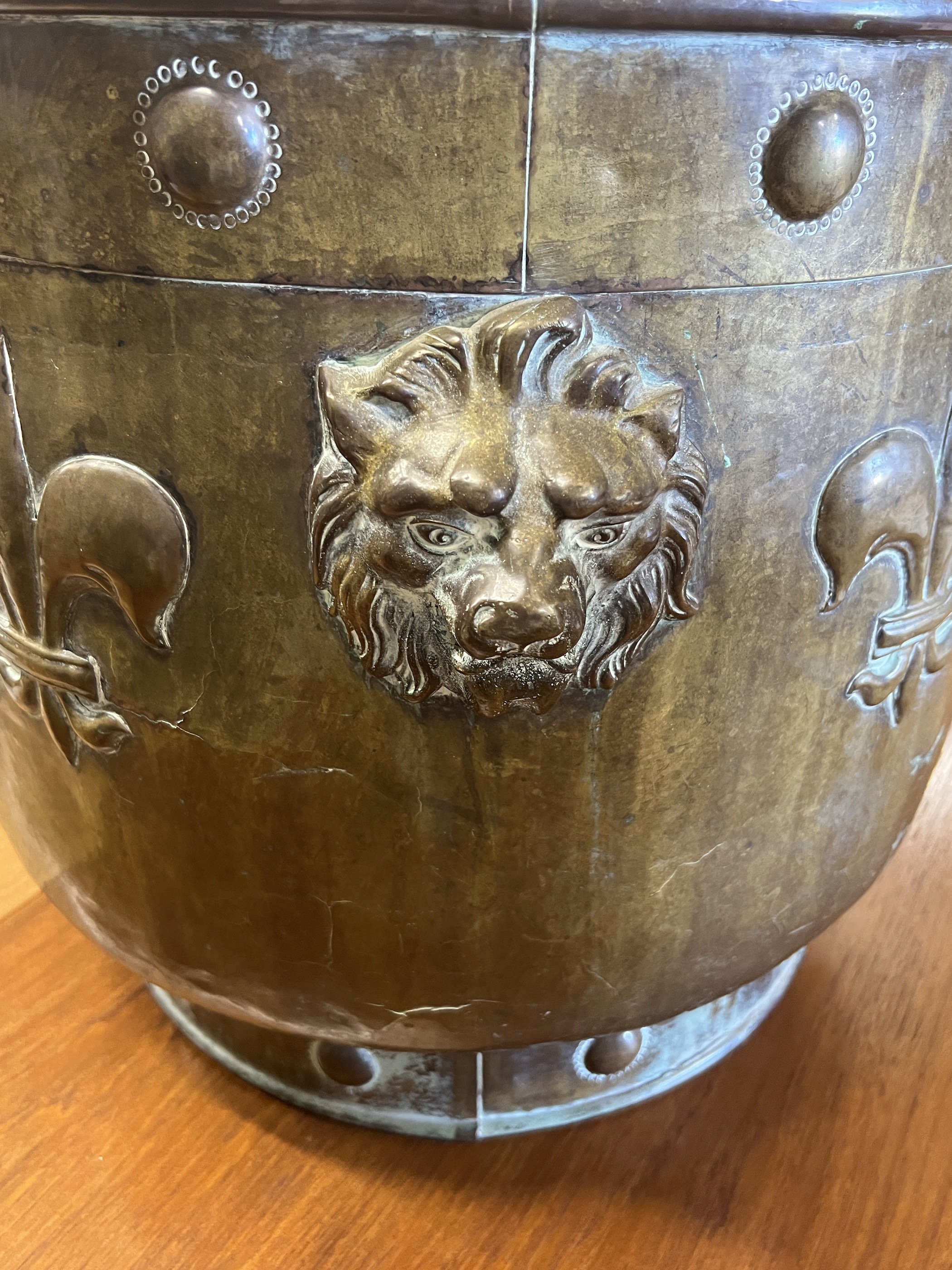 A 19th century Dutch embossed copper coal bin, diameter 49cm, height 45cm